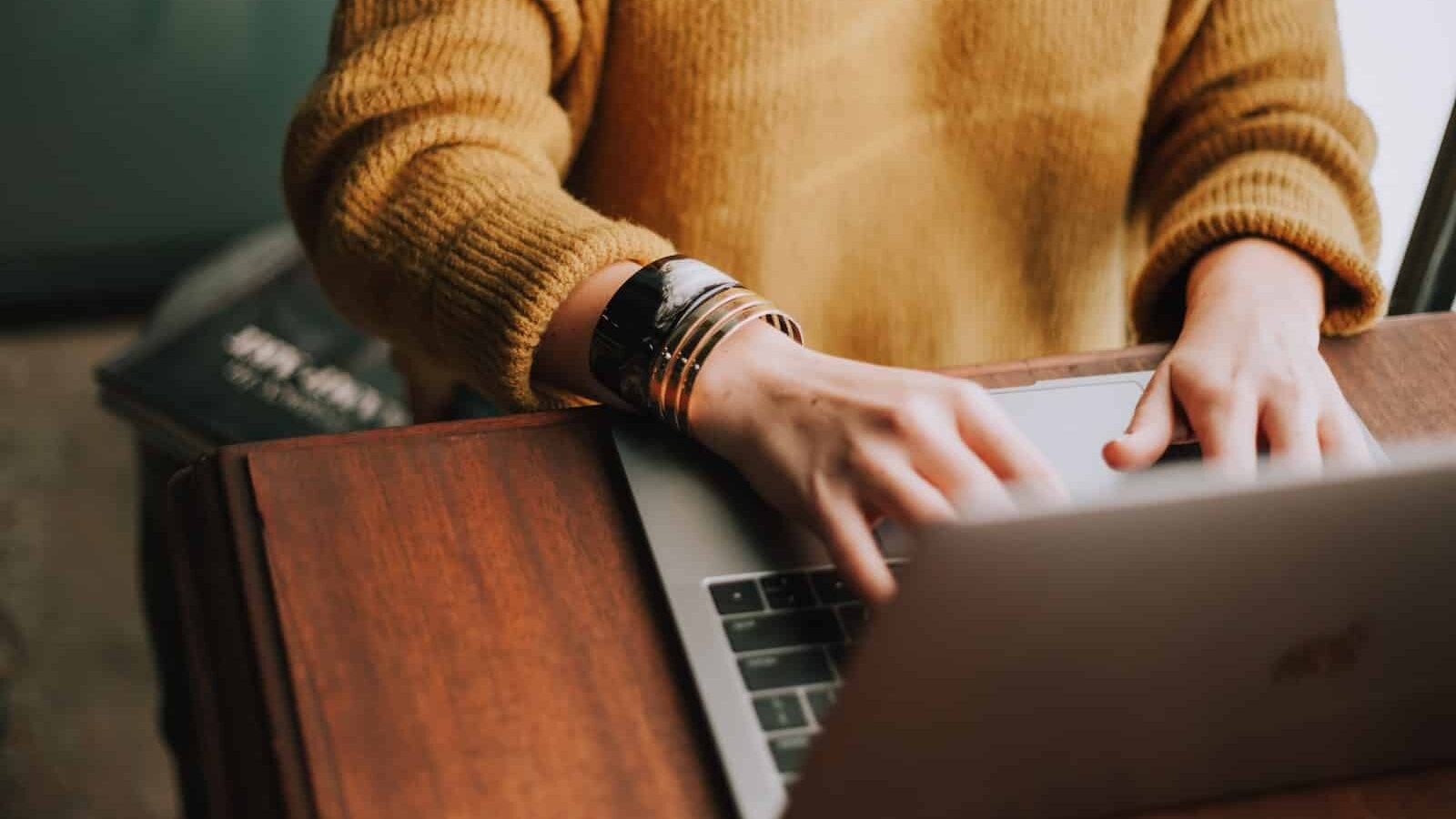 person using laptop computer