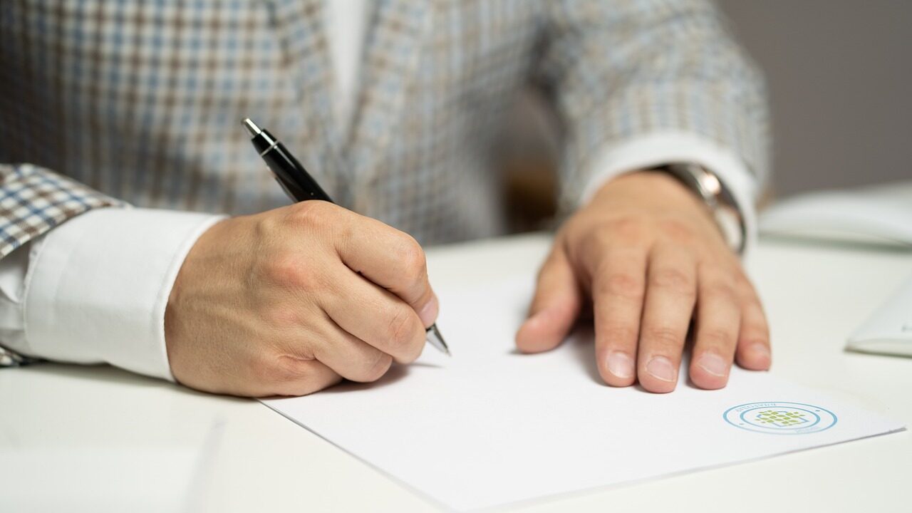 man, sign, paper