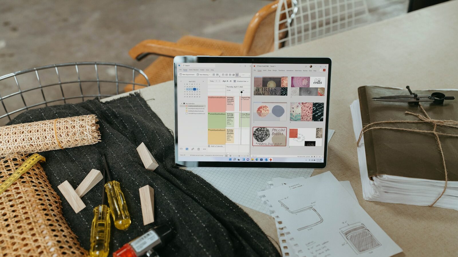 a laptop computer sitting on top of a table