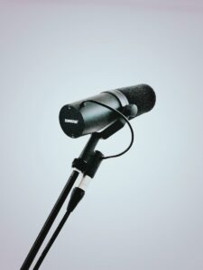 black and gray microphone on white background